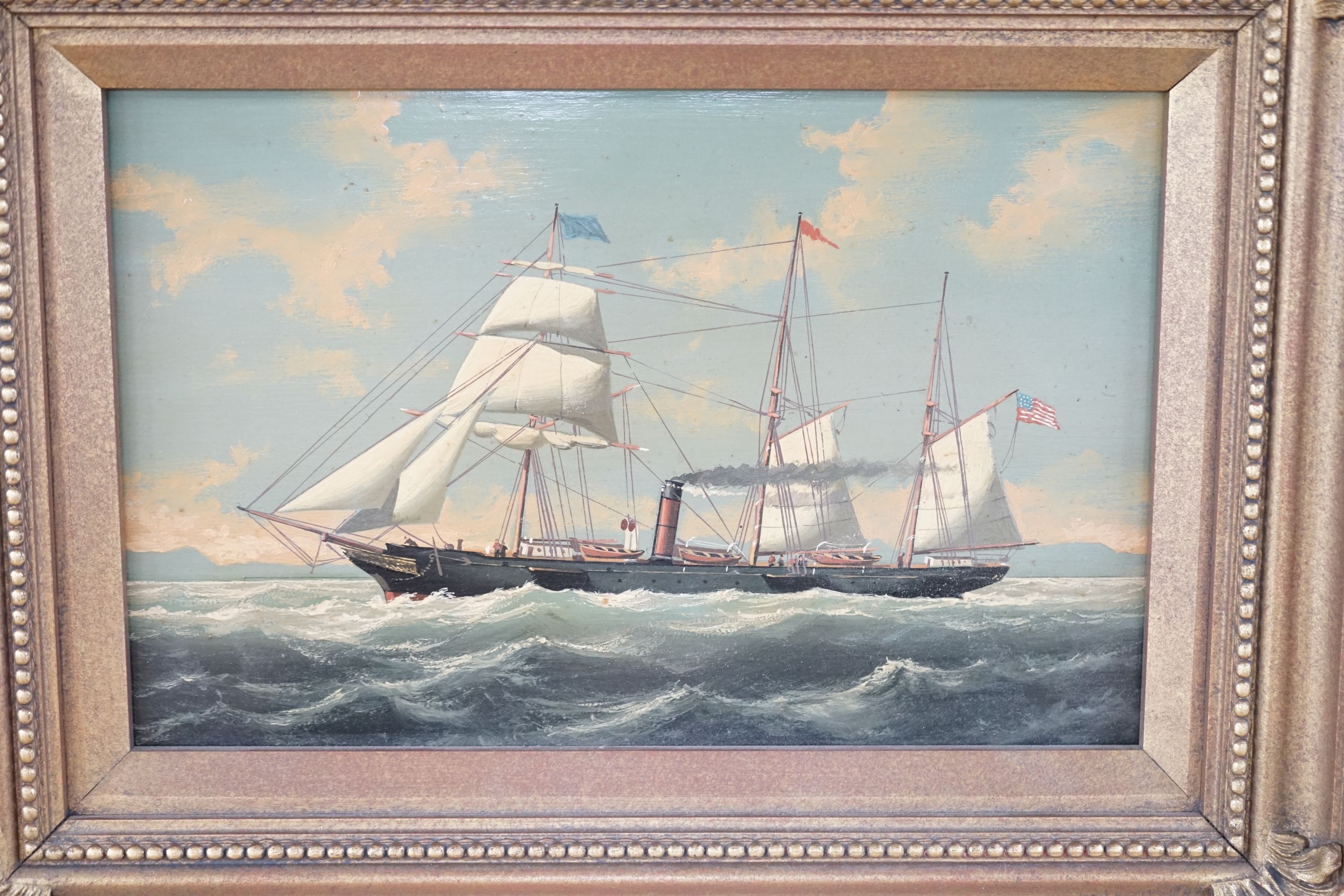 A pair of modern oils on panel of American and English steam and sail ships at sea, 17 x 26cm